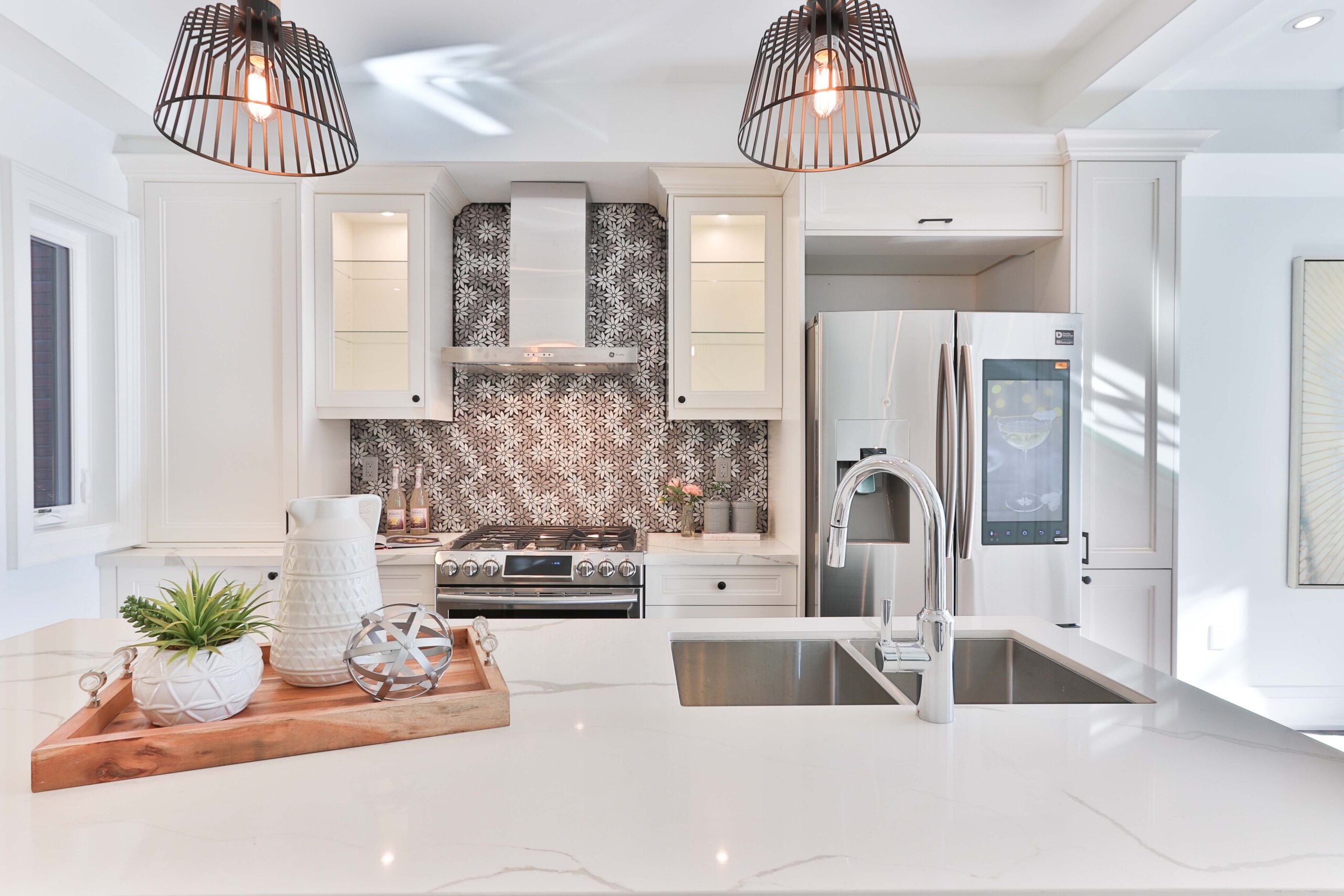 Glass-Front Cabinets and white Sink Island